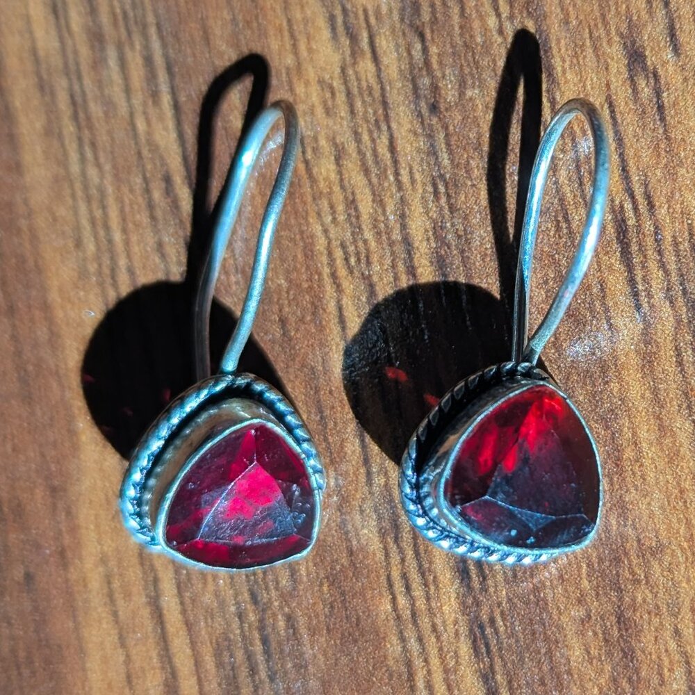 Silver earrings with red stone